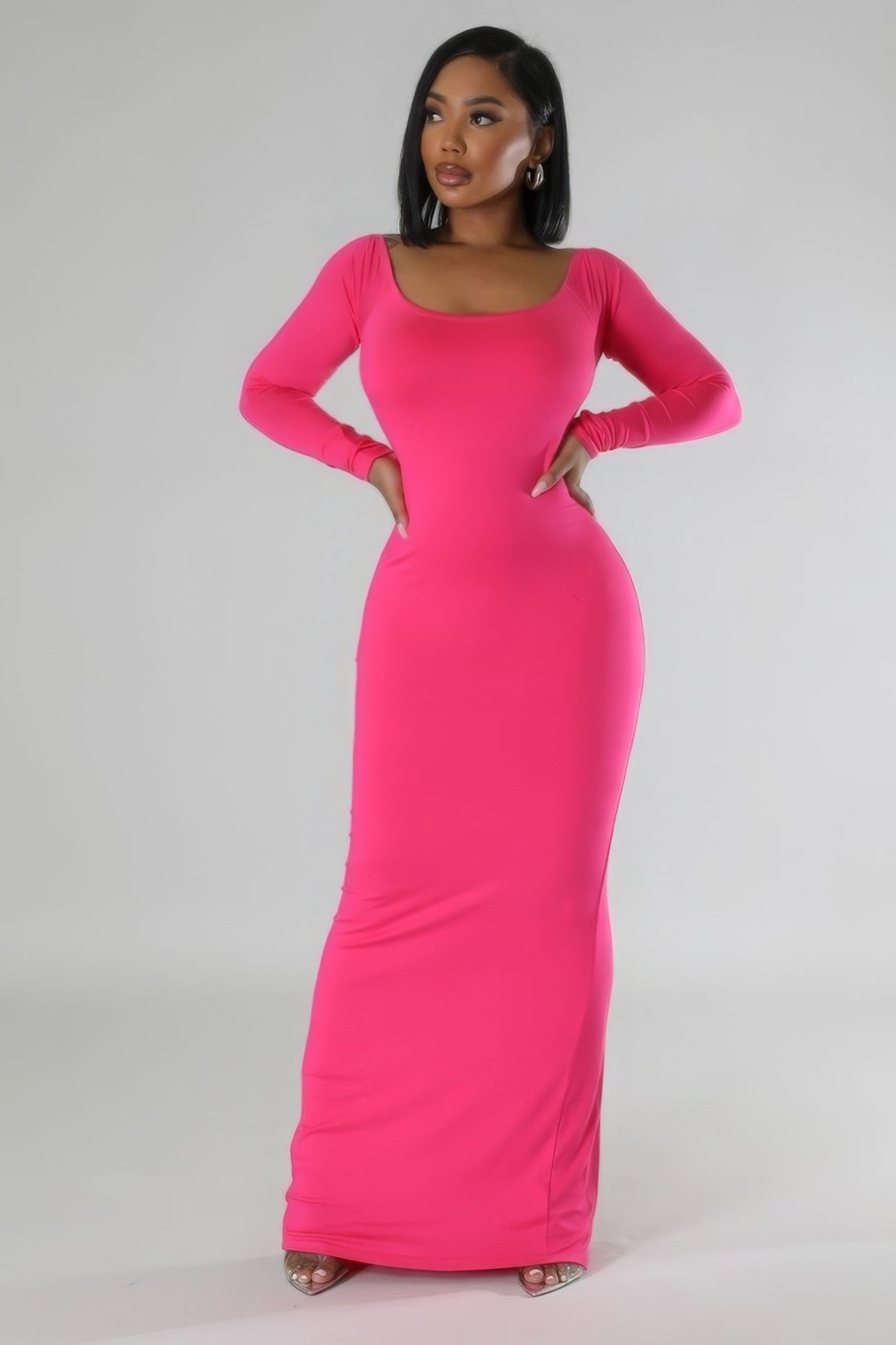 Model wearing pink Long Sleeves Open Back Midi Dress with hands on hips