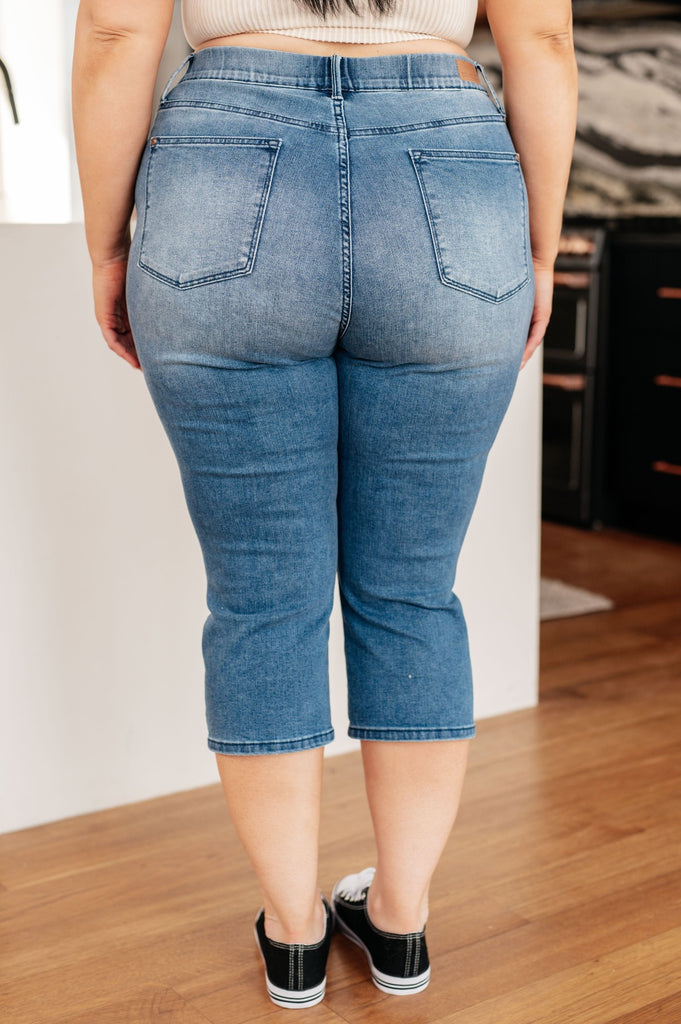 back view of plus size medium wash judy blue High Rise Pull On Capri Jeans
